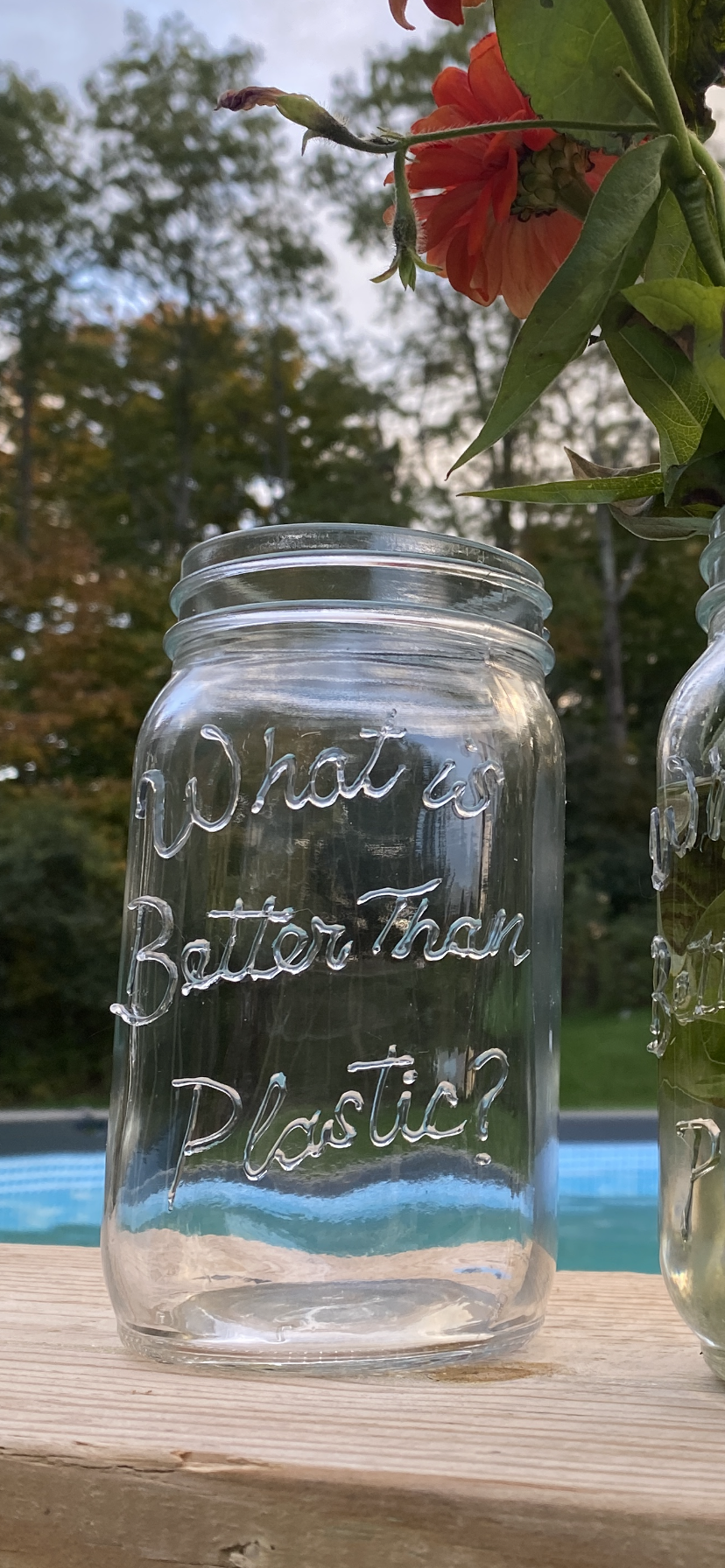 Set of (2) Storage Mason Jars “What is Better Than Plastic?” Brand Embossed Glass