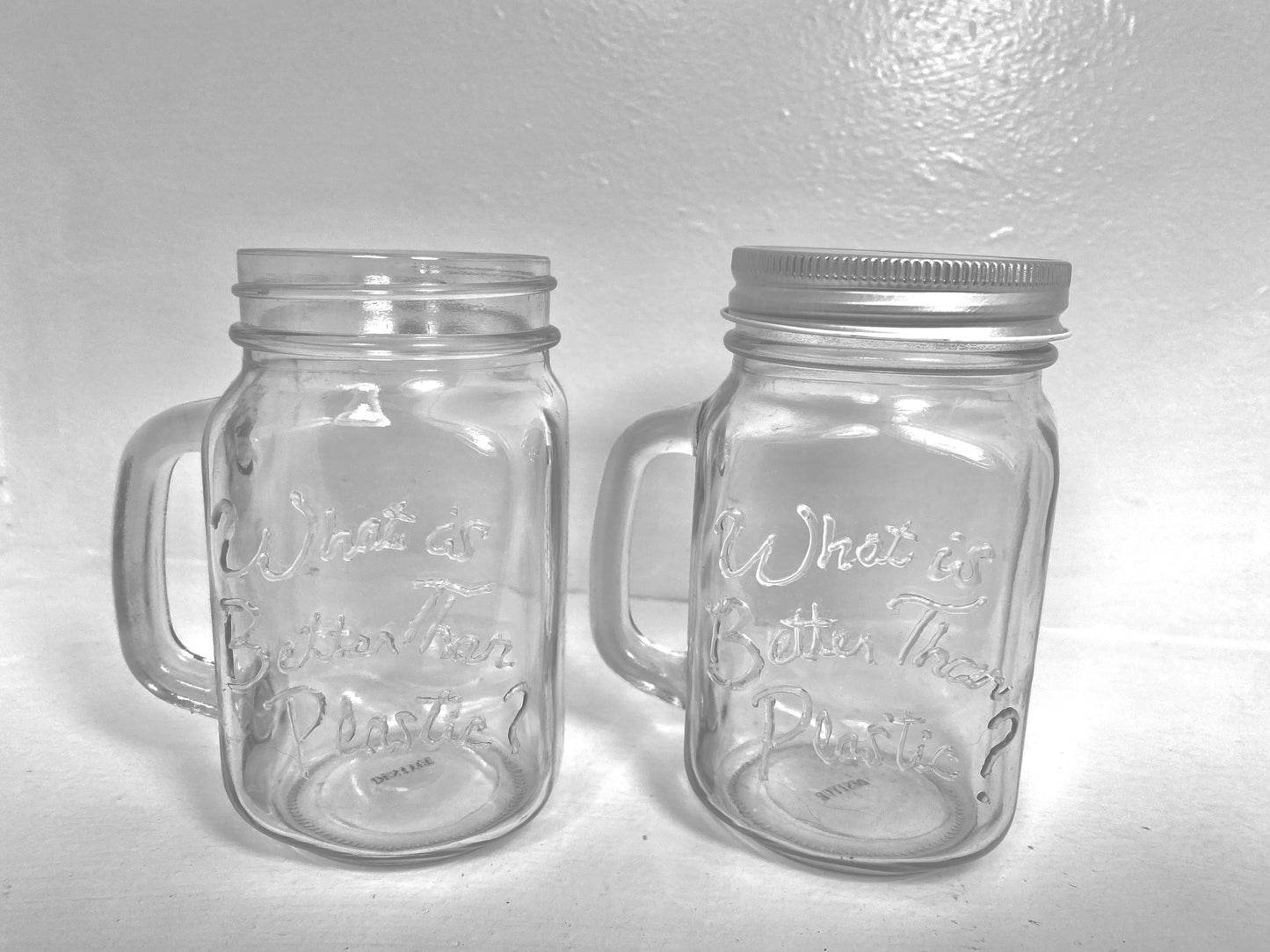 Set of (4) Drinking Mason Jars w/ Handles “What is Better Than Plastic?” Brand Embossed Glass