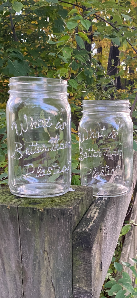 Set of (2) Storage Mason Jars “What is Better Than Plastic?” Brand Embossed Glass