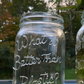 Set of (2) Storage Mason Jars “What is Better Than Plastic?” Brand Embossed Glass